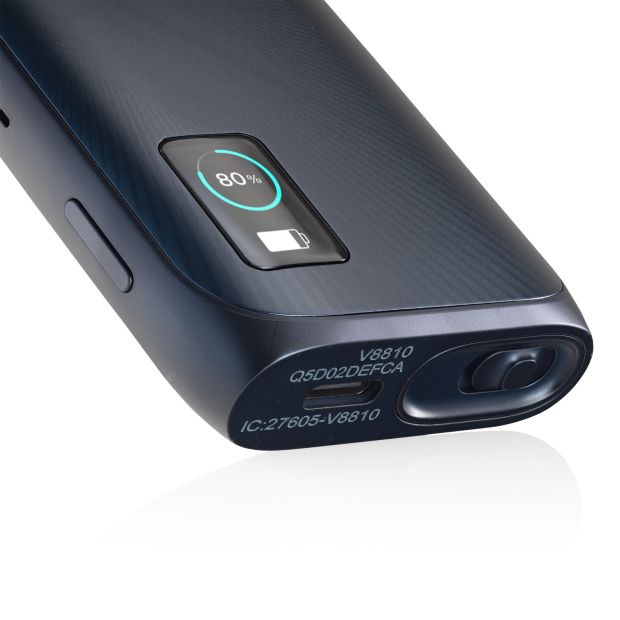 A close up of a navy Vuse Ultra kit that shows the display screen, the charging port, the menu button and a toggle on the base.