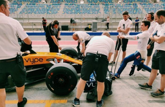 Vaping Pit Stop: A Vype-emblazoned McLaren car is attended to during testing for the 2019 Formula One season. (Photo: McClaren Racing)