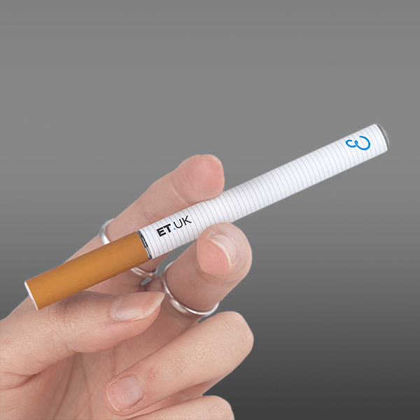 Features an Electric Tobacconist cigalike battery in-hand, complete with a refill cartomizer.