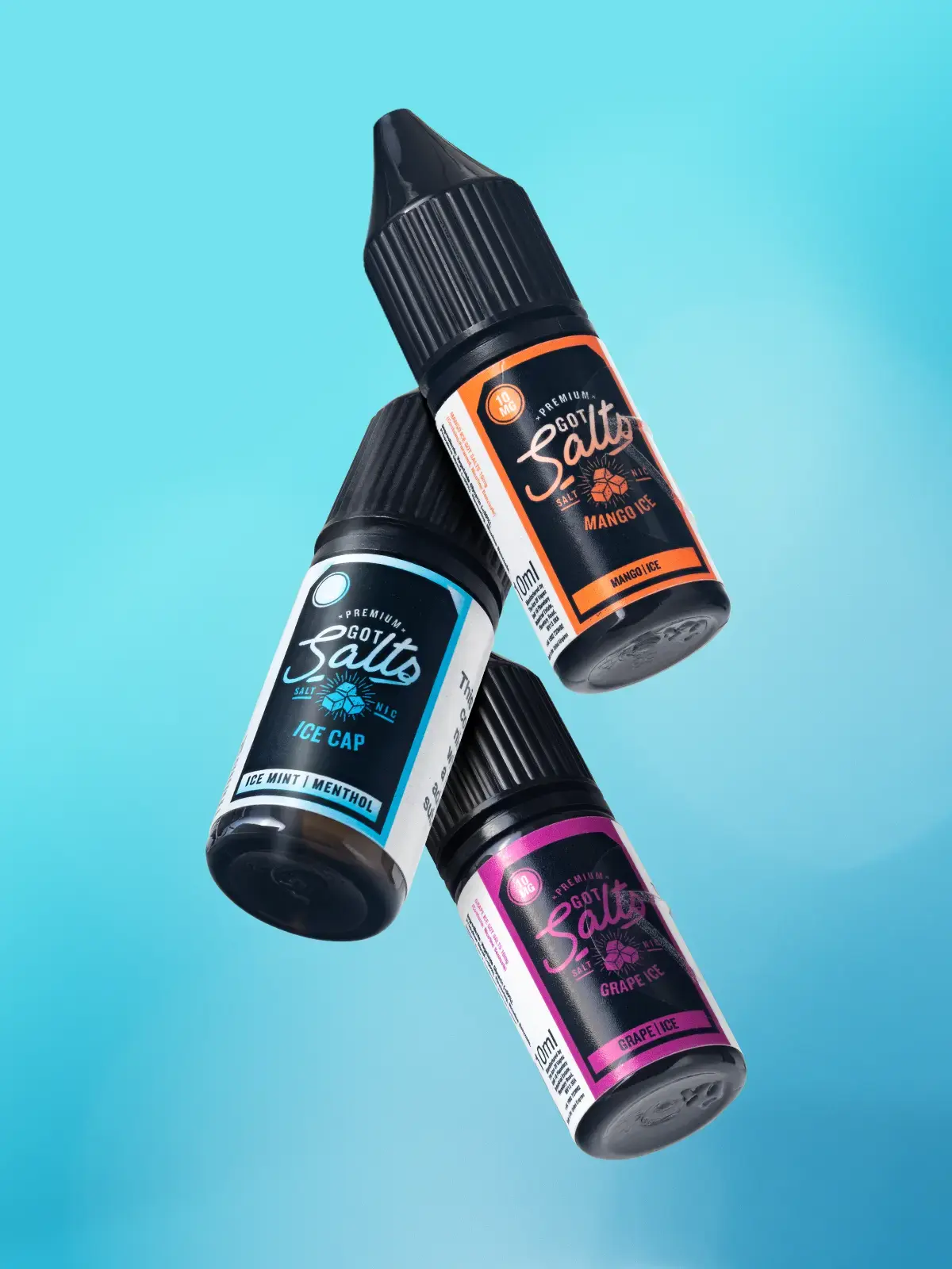 Three bottles of Got Salts e-liquid; Mango Ice, Ice Cap and Grape Ice floating in front of a blue background