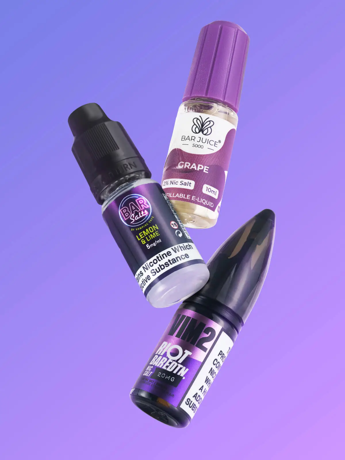 Three bottles of e-liquid; BAR Salts Lemon & Lime, Bar Juice 5000 Grape and Riot Bar Edtn VIM2, floating in front of a purple background