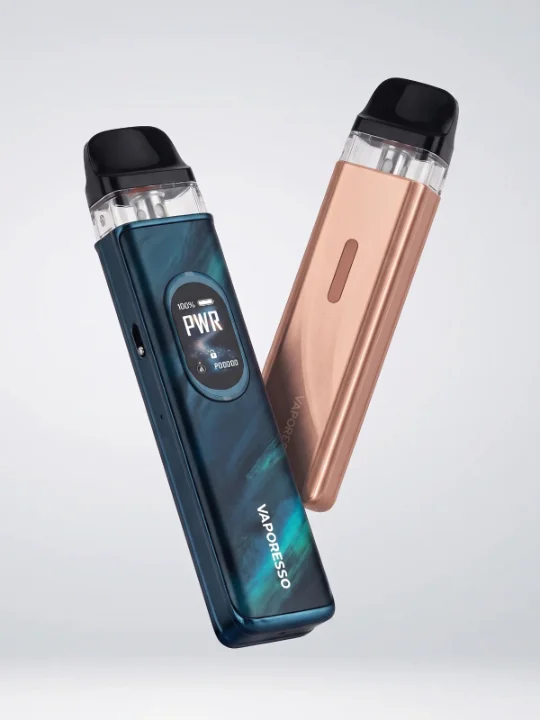 A Vaporesso XROS 6 Mini device in brown, and a Vaporesso XROS 6 device in aurora blue, floating in front of a light background.