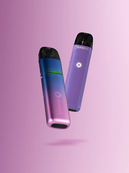 A pink and blue Hayati Quokka Elite and a purple Hayati Quokka Lite kit floating side by side on a pink background