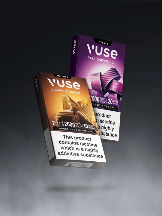Two packs of Vuse Extra Intense pods, one pack is Creamy Tobacco flavoured and another pack is Passionfruit Ice flavoured, floating side by side on a stylised grey background.